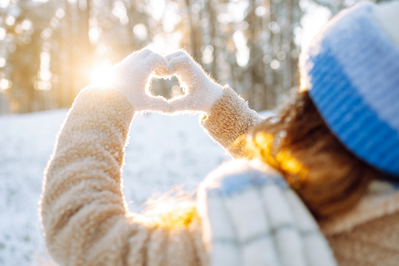 woman enjoying the sun on a winter day