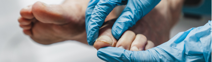 doctor examining patient's feet