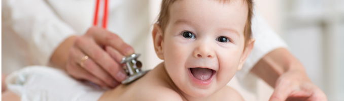 smiling baby at the doctor