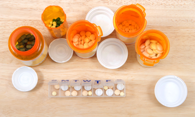 various pills bottles and pill organizer